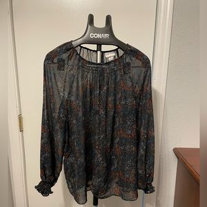 Long sleeved sheer blouse